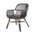 Rattan armchair for indoor and outdoor use in natural brown finish